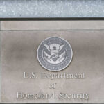 ALERT: Kremlin Kill Team Hunted In D.C. Department of Homeland Security sign with emblem