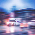 Mass Shooting: Kids Hit Ambulance speeding through city street at night