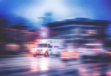 Mass Shooting: Kids Hit Ambulance speeding through city street at night