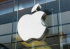 TODAY: New Update Drains iPhones?! Apple logo displayed prominently on a glass storefront