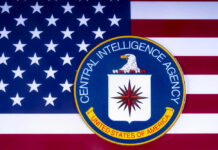 CIA Sparks Mind-Control Buzz CIA emblem over United States flag background.