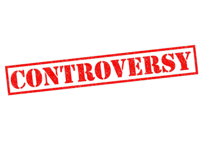 Controversy stamp in bold red letters
