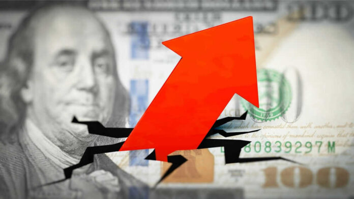 shutterstock_2132991311 Red arrow on cracked $100 bill.