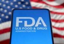 FDA Alarm – Deadly Weight-Loss Shots FDA logo displayed on a smartphone with an American flag background