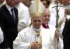 Pope’s Health Jolt: Surgery Imminent Catholic bishop in white vestments holding a crosier