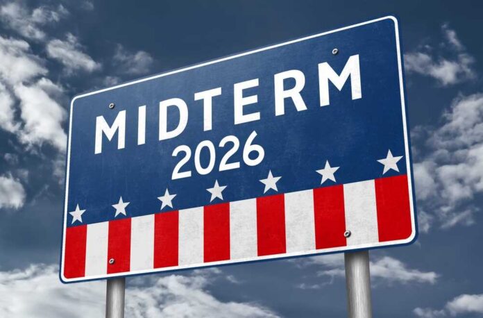 Election sign reading Midterm 2026 against a cloudy sky