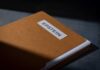 Epstein Bombshell Targets Trump A brown folder with a label reading 'EPSTEIN'