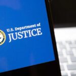 DOJ Targets TV ‘Boycott’ – Antitrust Bomb? U.S. Department of Justice logo on a smartphone screen