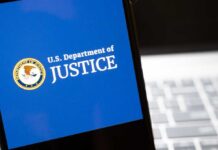 U.S. Department of Justice logo on a smartphone screen