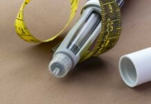 Weight-Loss Shot Tames Urges? – Shocker Insulin pen with needle and yellow measuring tape